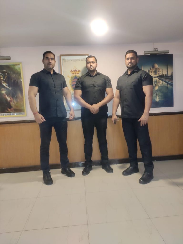 Bodyguards bouncers for security during a business meeting held at a hotel in Delhi